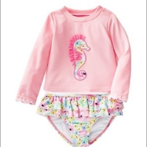 Infant girl bathing suit. Size 18mnts